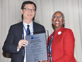 Ricky Leung, Airport Authority Hong Kong’s General Manager, Technical Services (left), receives the award at the presentation ceremony in Morocco on behalf of the authority.